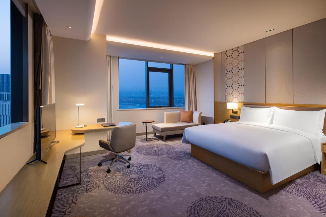 Holiday Inn Tianjin Xiqing By Ihg Exterior foto